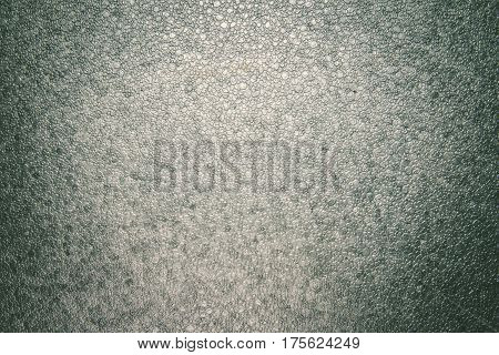 Detailed background texture of gray styrofoam material. Macro shot.