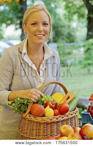 woman on the fruit market with basket
