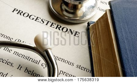 Progesterone written on a page. Hormones concept.