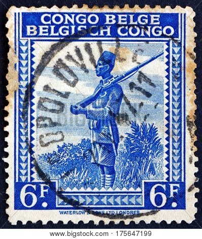 BELGIAN CONGO - CIRCA 1942: a stamp printed in Belgian Congo shows Askari local soldier serving in the army of the European colonial power in Africa circa 1942