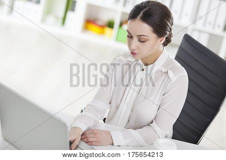 Close Up Of Strict Woman Working In Office