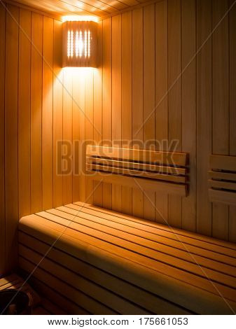 Luxury Sauna room with traditional sauna accessories