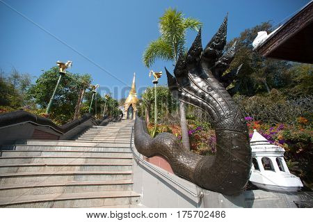 UDON THANI,THAILAND - JAN 25,2014: Image of Thai art of 7 heads Serpent on staircase to Chedi Prathom Rattanamahaburaphachan.The Chedi in Sri Lanka style,in Wat Pa Phu Kon of Na yung in Udon Thani Province,Thailand.