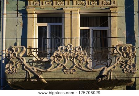 The part of facade of an old residential building on pedastrian street of Samara city