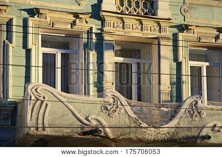 The part of facade of an old residential building on pedastrian street of Samara city