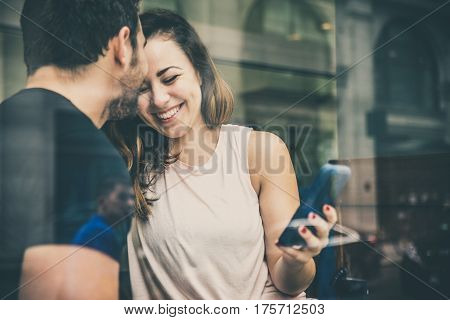 Couple of lovers drinking coffee in a coffehouse bar