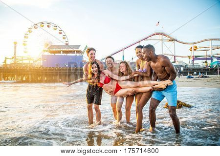 Multi-ethic group of people having fun on the beach