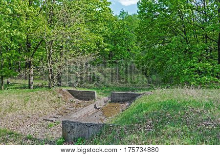 The concrete hydraulic structure for the protection of soil from the impact of the erosion of melt water and rain water