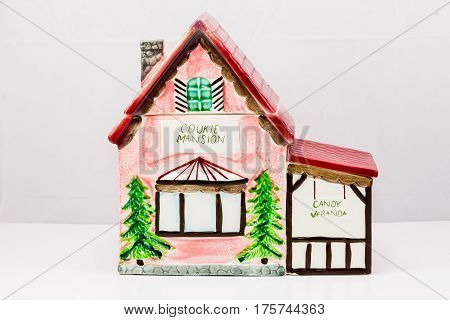 Ceramic cookie and candy jar shaped like a house