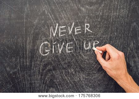 Never Give Up Words Written On The Chalkboard