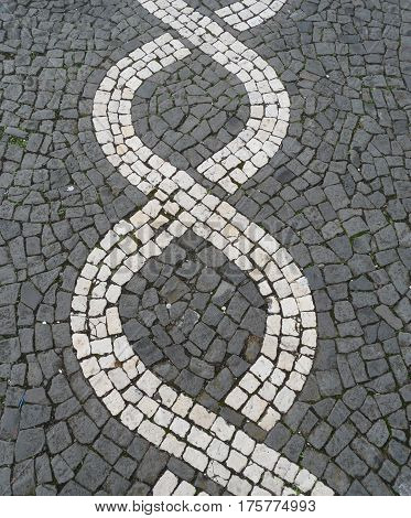 Typical Portuguese black and white stone mosaic 