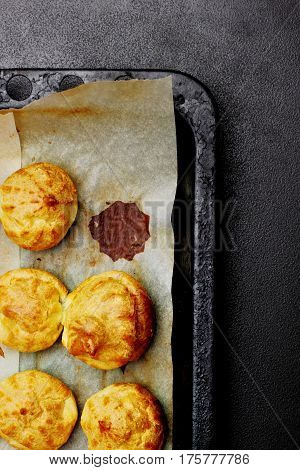 Baked Profiteroles On Tray Ready For Croquembouche. Top View. Copy Space