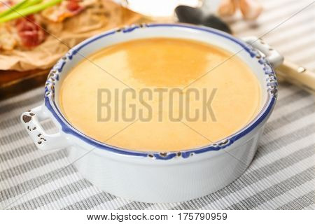 Delicious cream soup on table