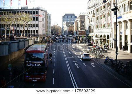 COLOGNE, GERMANY - NOVEMBER 24: A bus for city sightseeing stands in the lively Trank-Lane near the Cologne Cathedral on November 24, 2016 in Cologne.