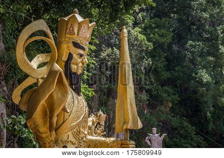Gold buddhist sacred staue at temple in Ipoh, Malaysia