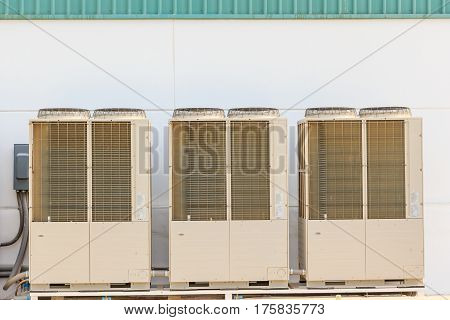 Air conditioning system assembled on side of a building - cooling and heating residential system