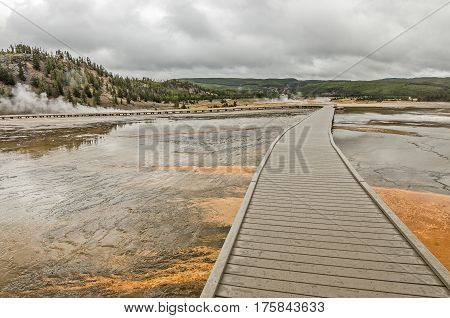 Boardwalk to keep people safe from the extremely hot water and to protect the fragile environment at Midway Geyser Basin in Yellowstone National Park