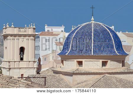 foreground of dome and bell tower of san bartolome church in the city of Petrer province of alicante spain