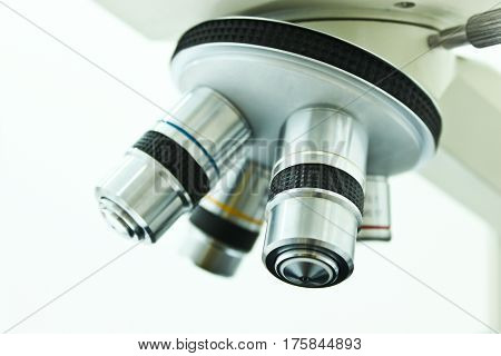Objective Lens of Microscope Isolated on the White Background