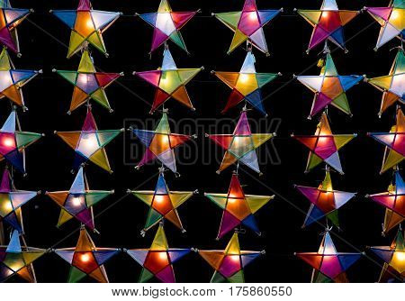 Multi colored star lamps and background colour