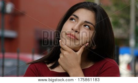 A Young and Attractive Teen Girl Thinking