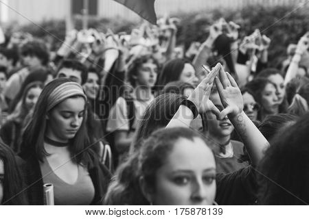 MILAN ITALY - MARCH 8: Secondary school students take part in a march to celebrate the International Women's Day on MARCH 8 2017 in Milan.