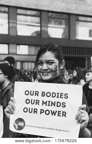 MILAN ITALY - MARCH 8: Secondary school students take part in a march to celebrate the International Women's Day on MARCH 8 2017 in Milan.