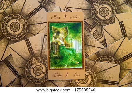 Moscow Russia - January 29 2017: Tarot card King of Wands. Labirinth tarot deck. Esoteric background