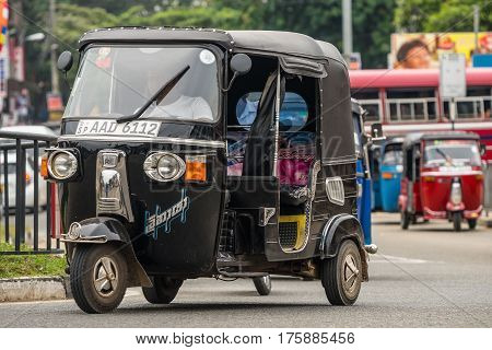 Mirissa, Sri Lanka - January 01, 2017: Tuk-tuk Moto Taxi On The Street. Famous Thai Moto-taxi Called