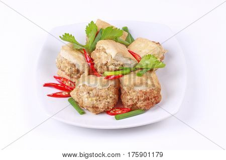 Chinese foodFried gold bar as spicy fried tofu wrap minced pork .