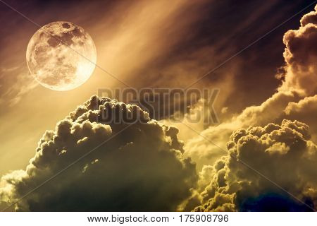 Nighttime Sky With Clouds And Bright Full Moon With Shiny. Sepia Tone.