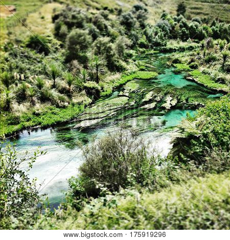 A Beautiful waterfall landscape flowing down river