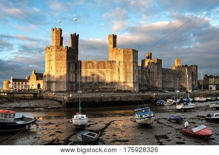 Caernarfon Wales United Kingdom - September 19 2016: Evening view of Caernarfon Castle with its polygonal towers in North Wales