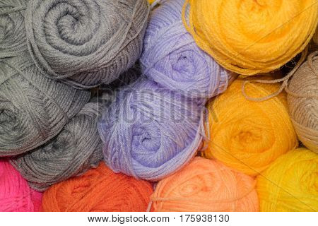 Many woolen yarn orange violet gray and peach color soft texture