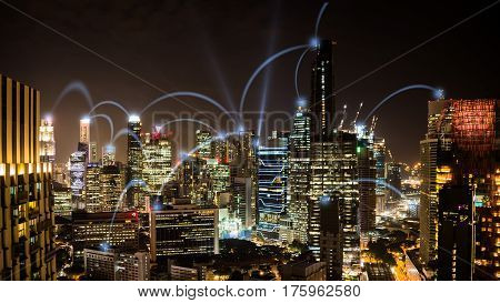 Connected city concept: A wireless business network connecting offices in the business skyscrapers of Singapore