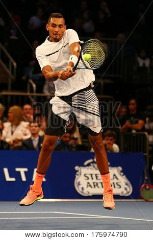 NEW YORK - MARCH 6, 2017: Professional tennis player Nick Kyrgios of Australia in action during  BNP Paribas Showdown 10th Anniversary tennis event at Madison Square Garden in New York