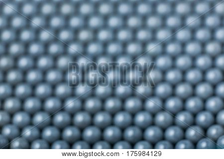 Blurred Background Of Grey Airsoft Balls Of 6Mm