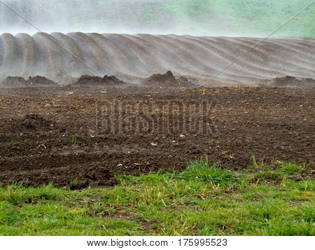 Fog Lifting From A Freshly Ploughed Area Of Land - Farmwork
