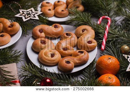 Traditional Swedish Christmas Saffron Buns (lussebulle Or Lussekatt). Swedish Christmas. Dark Backgr