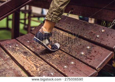 Childrens Orthopedic Shoes On The Boys Feet