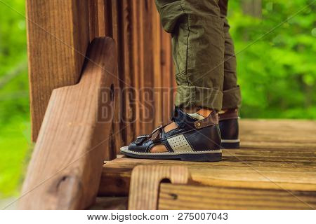 Childrens Orthopedic Shoes On The Boys Feet