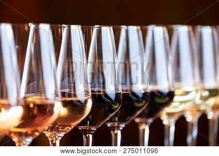 Wine Glasses In A Row. Buffet Table Celebration Of Wine Tasting. Nightlife, Celebration And Entertai