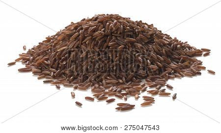 Close Up Photography Of Long Grain Red Rice Heap Over White Background. Packshot Style