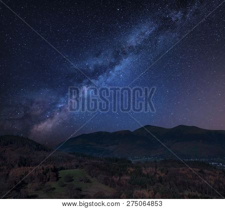 Stunning Vibrant Milky Way Composite Landscape Image Over Catbells Near Derwentwater In The Lake Dis