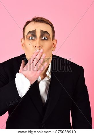 Keeping Secret. Mime Artist Cover Mouth With Hand. Mime With Face Paint. Man Actor With Mime Makeup.