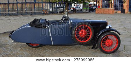 St Neots, Cambridgeshire, England - October 07, 2018: Vintage Blue Bsa 3 Wheel Motor Car Parked On T