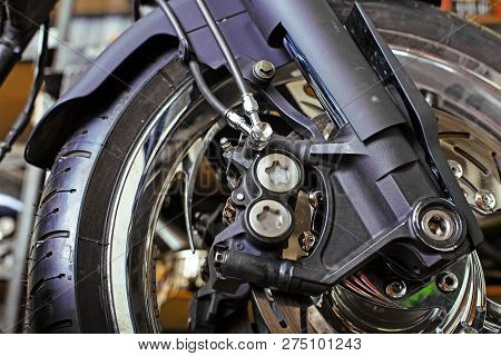 Cropped Close Up Shot Of Beautiful And Custom Made Motorcycle In The Workshop
