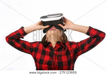 Young Woman Using The Virtual Reality Headset. Future Is Right Now. Isolated Portrait
