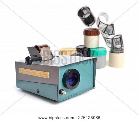 Vintage Slide Projector Is An Opto-mechanical Device For Showing Photographic Slides. Isolated On Wh
