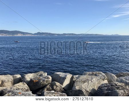 View From The Pier With Boats At The Distance In Sanxenxo Galicia Spain